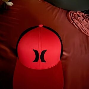 Red and black Hurley hat never used